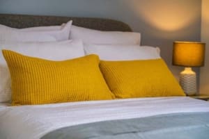 Bedroom in new house in Peebles. Grey, White and yellow bedding
