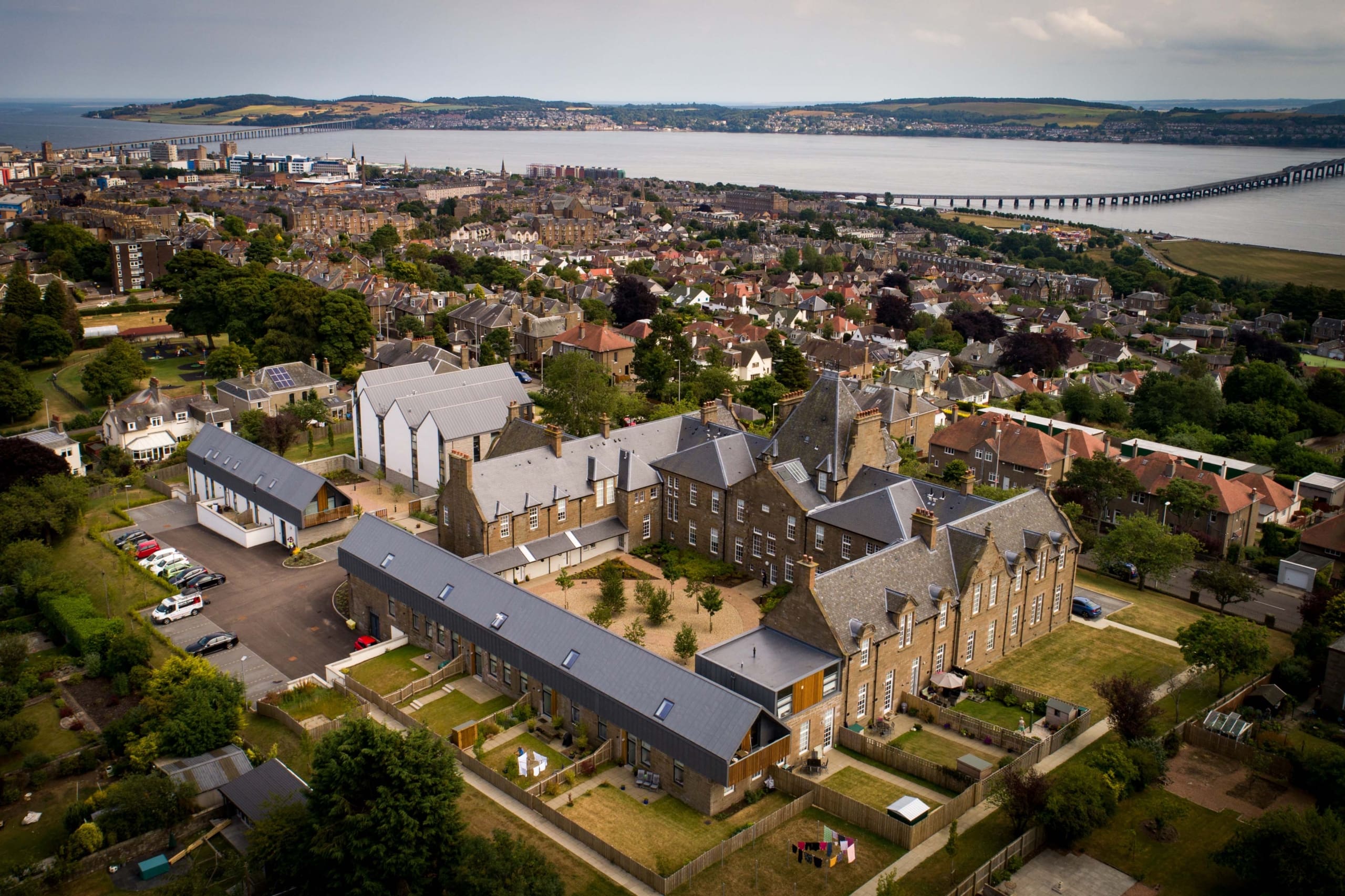 Ariel photography over new homes development at Parkview, Dundee, over surrounding area onto the river tay and beyond