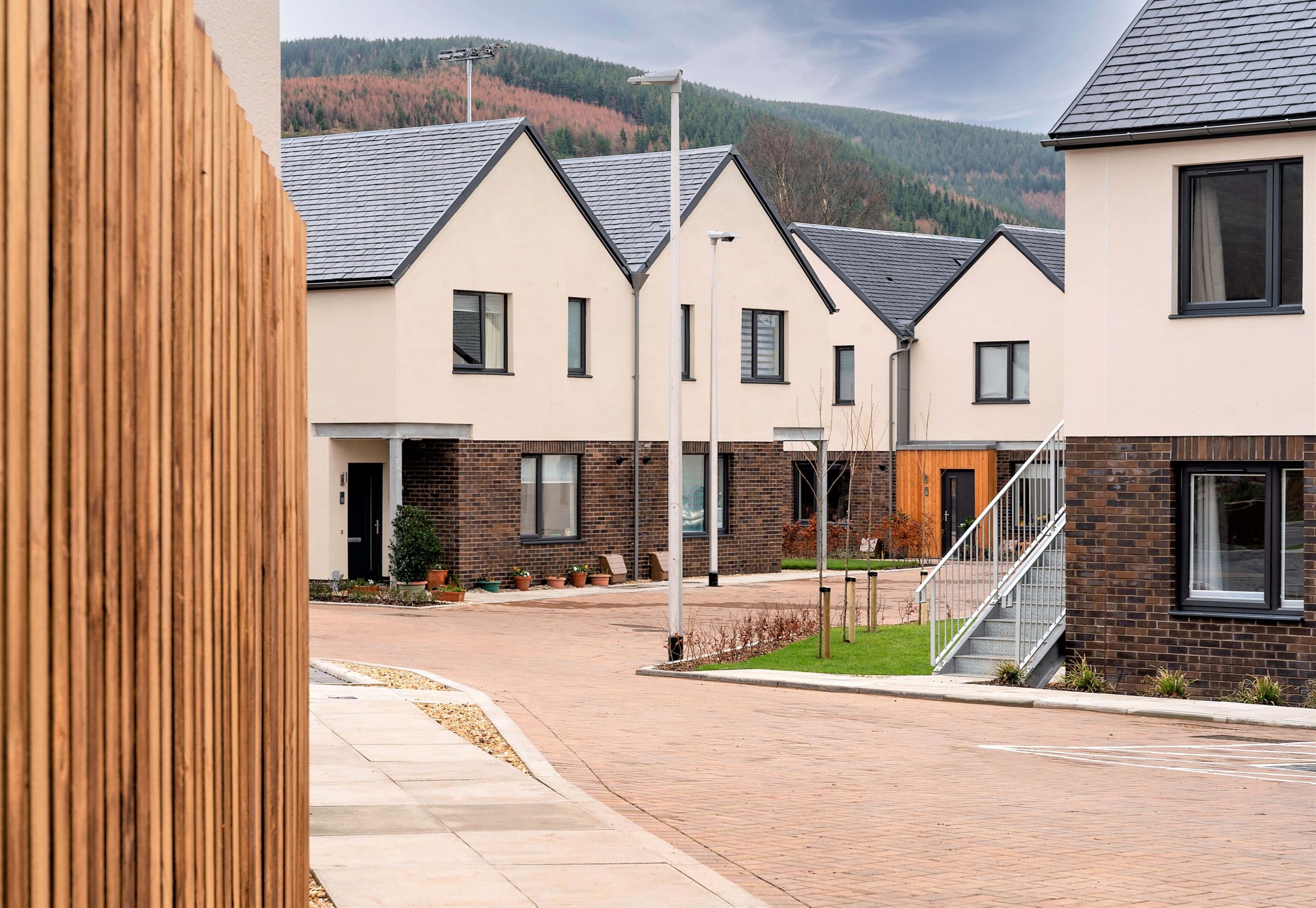 New build houses street scene with two storey homes at Caerlee Mill, Innerleithen