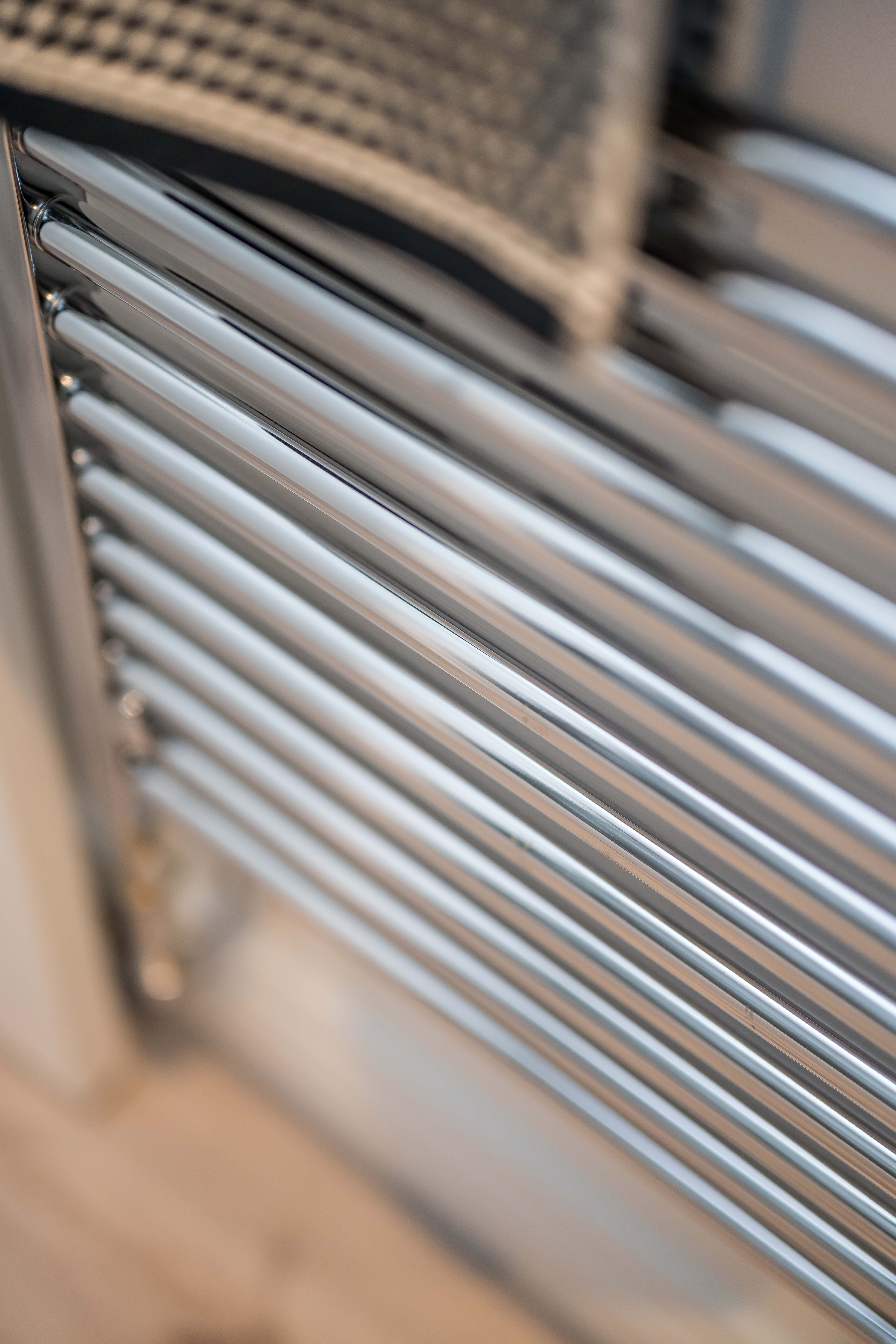 Chrome shower radiator rale in a bathroom in new homes in Peebles